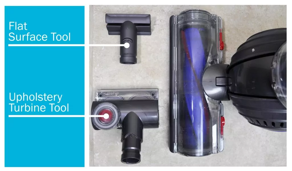 Close up shot of the flat surface tool and upholstery turbine tool included with the Dyson Ball Animal vacuum