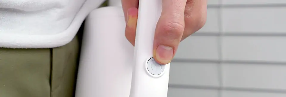 Pressing the power button both turns the vacuum on/off and changes the suction mode