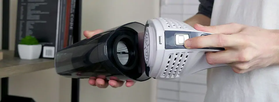 To get to the filter, release the dustbin on the Novete