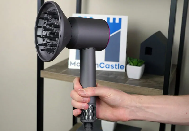 Dyson blow dryer with the magnetic diffused attached