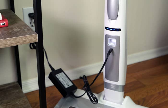 Comfyer vacuum charging (blue light indicates charge level)