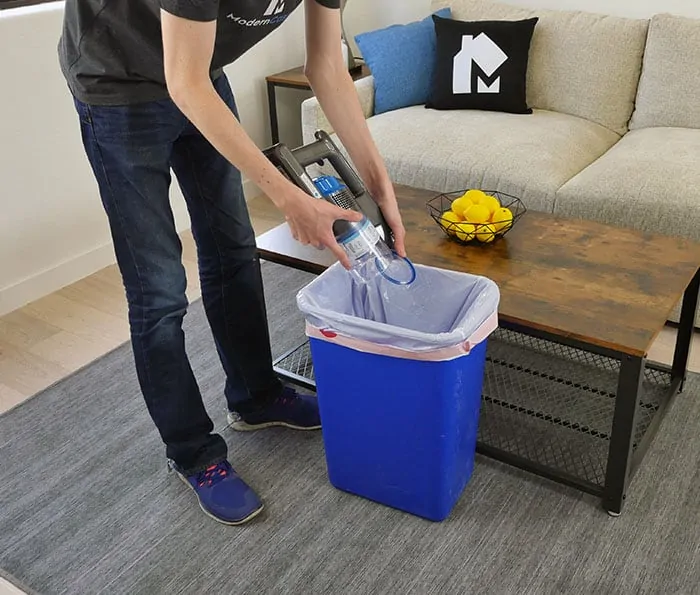 Emptying the dust bin on the Levoit cordless stick vacuum
