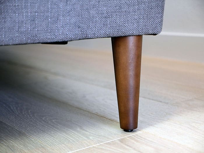 Tapered turned leg on the Allform sofa