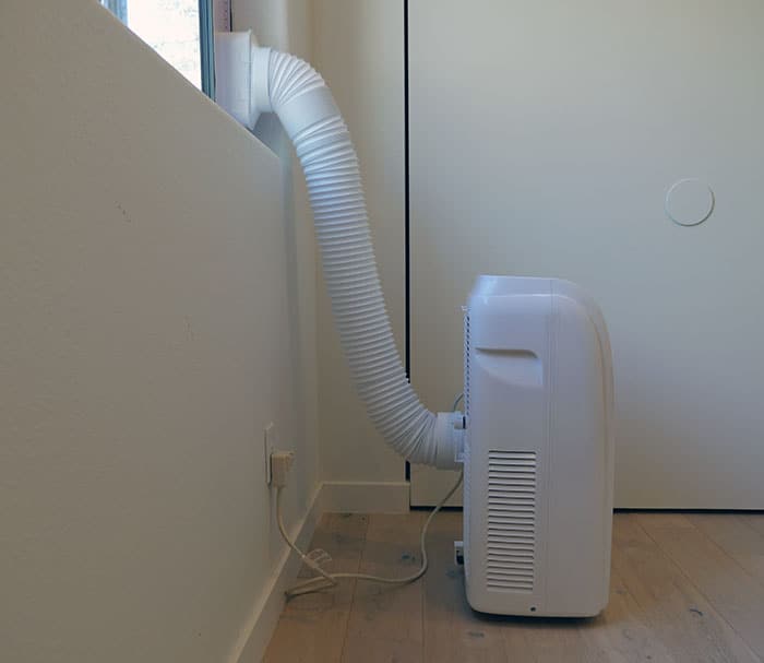 Side view of the B+D portable AC unit installed