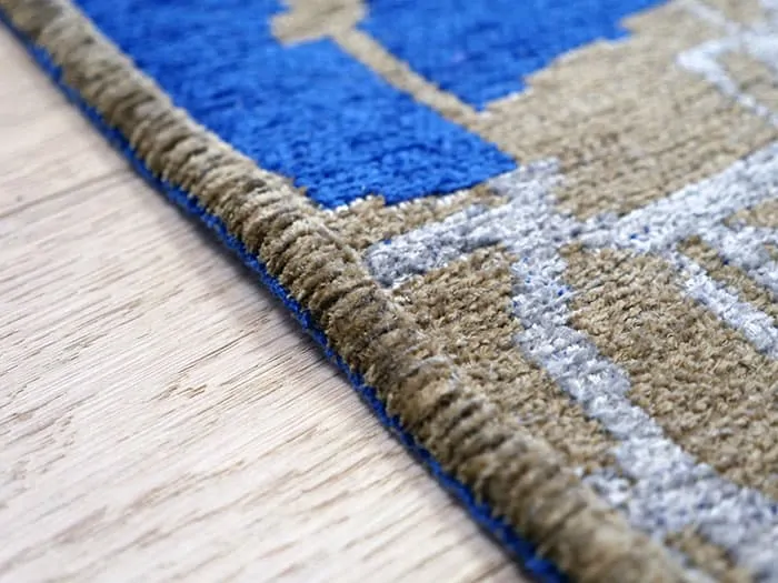 Standard side of the Rug & Love area rug