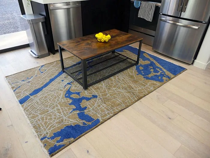 Rug & Love with a table on it