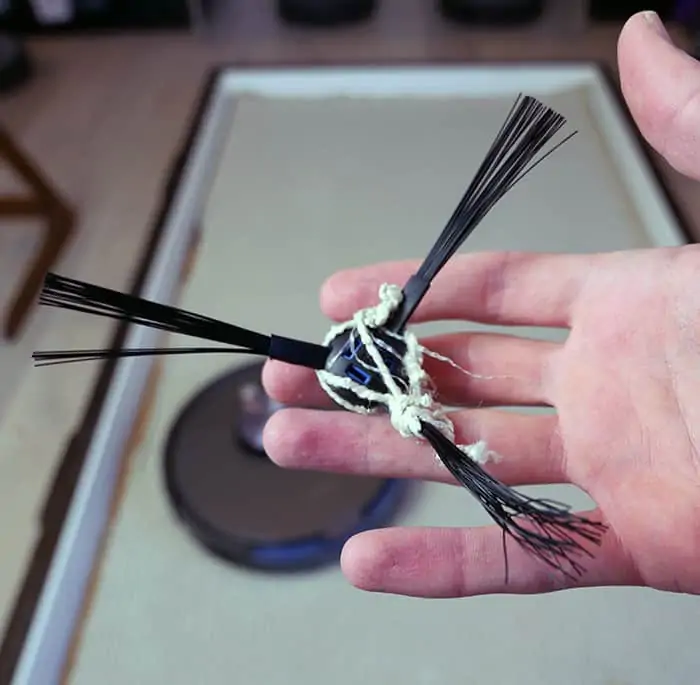 Carpet fibers caught on the iLife A10 spinning brush