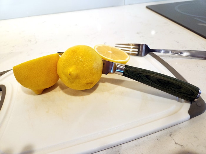 HexClad Knives cutting lemons